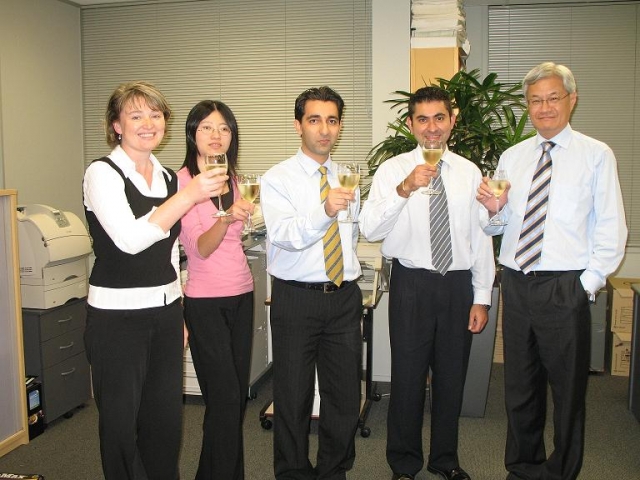 A toast on the successful go-live of SAP with some of the colleagues of the accounting department in Auckland